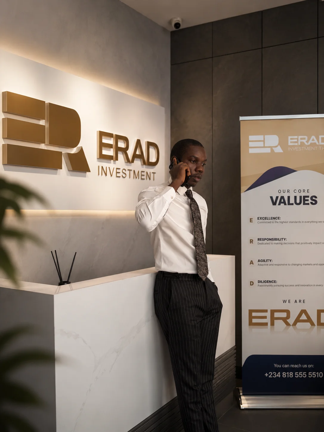ERAD Investment team member standing in the office reception area